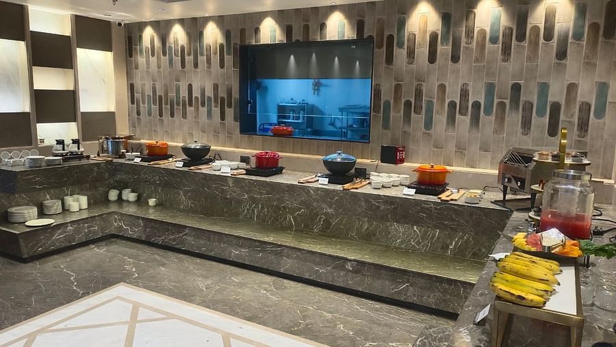 A vibrant buffet spread featuring a variety of dishes, desserts, and fresh fruits at  A vibrant buffet spread featuring a variety of dishes, desserts, and fresh fruits.